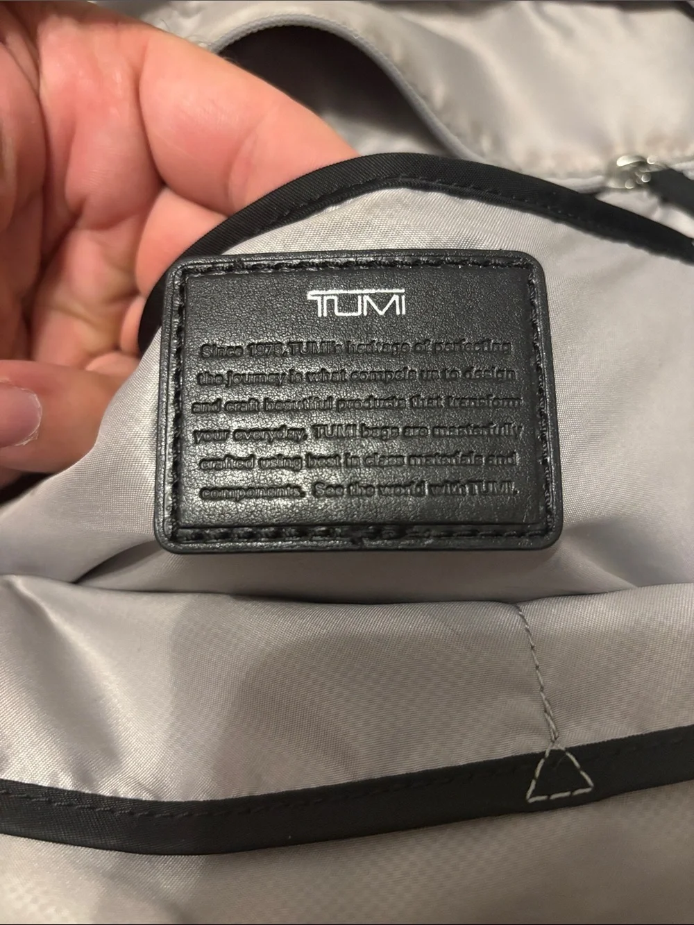 Tumi Black Nylon Backpack with Front Zip Pockets